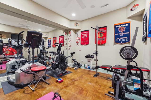 exercise room featuring visible vents and a ceiling fan