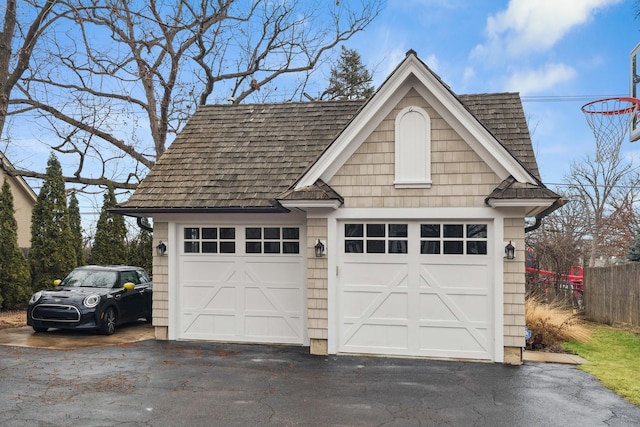 detached garage with fence