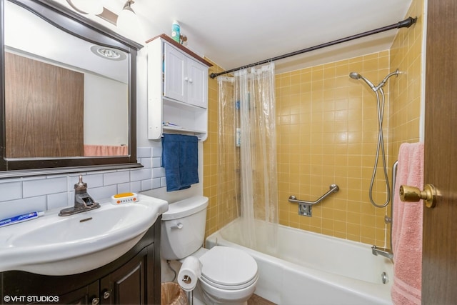 bathroom with toilet, tile walls, vanity, decorative backsplash, and shower / bath combo