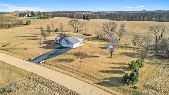 birds eye view of property featuring a rural view