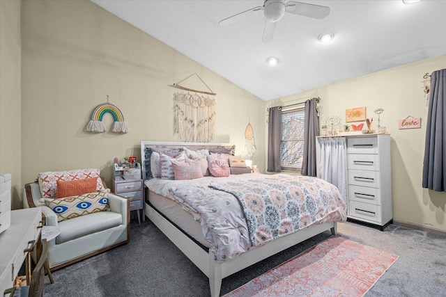 carpeted bedroom with vaulted ceiling, ceiling fan, and baseboards