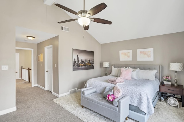 carpeted bedroom featuring high vaulted ceiling, baseboards, visible vents, and a ceiling fan