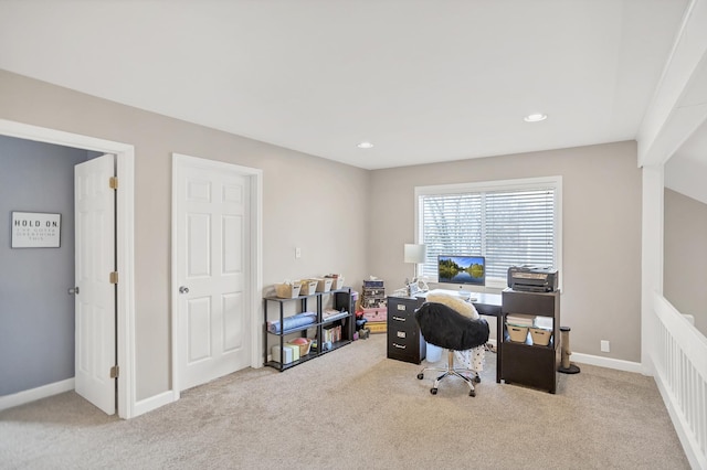 carpeted office space featuring recessed lighting and baseboards