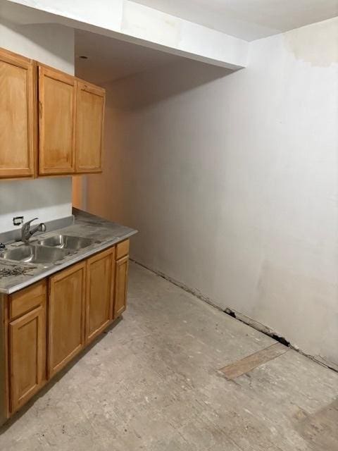 1519 E 68th St Unit 1, Chicago, IL 60637 - kitchen featuring a sink and brown cabinetry