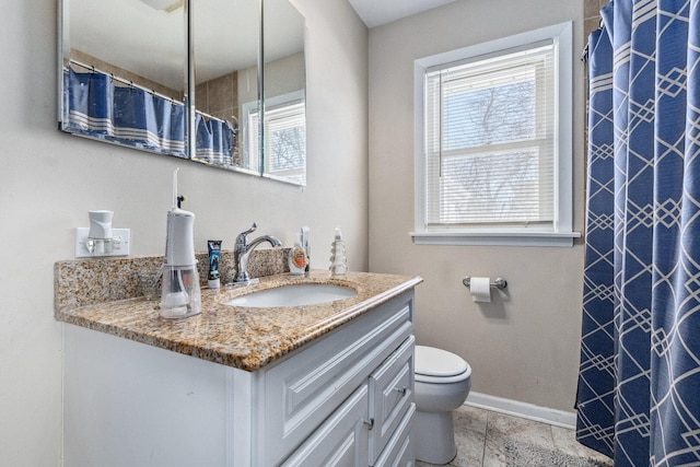 full bath with a shower with curtain, vanity, toilet, and baseboards