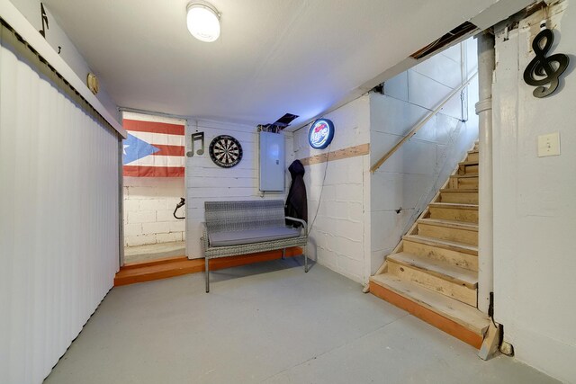 basement featuring concrete block wall