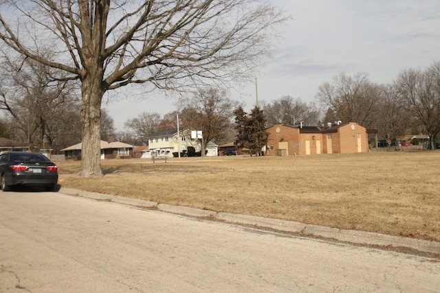 view of street featuring curbs