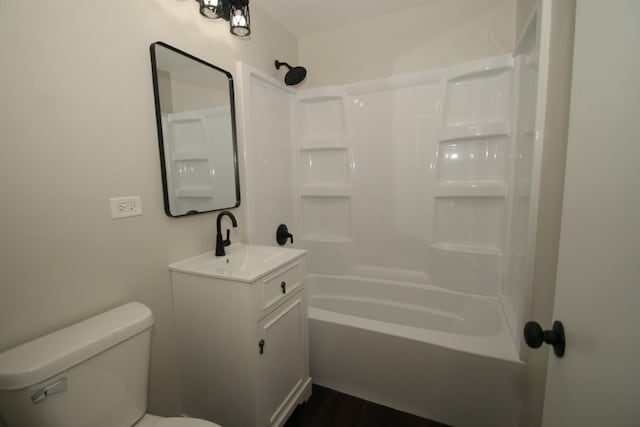 full bath featuring shower / bath combination, vanity, and toilet