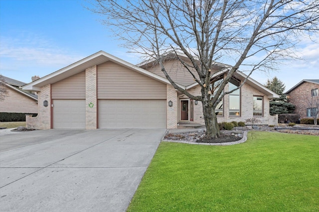 view of front of house with concrete driveway, brick siding, an attached garage, and a front yard