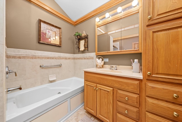 bathroom featuring a garden tub, crown molding, lofted ceiling, vanity, and tile patterned floors