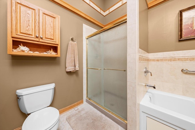 bathroom with a stall shower, baseboards, toilet, tile patterned floors, and a bath