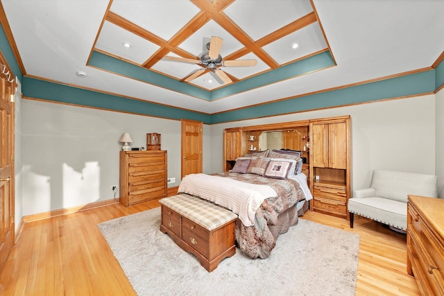 bedroom featuring crown molding, coffered ceiling, light wood-style flooring, and baseboards