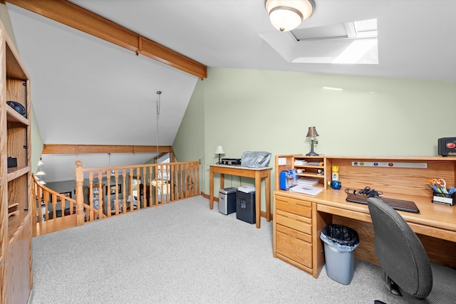 carpeted home office with vaulted ceiling with beams