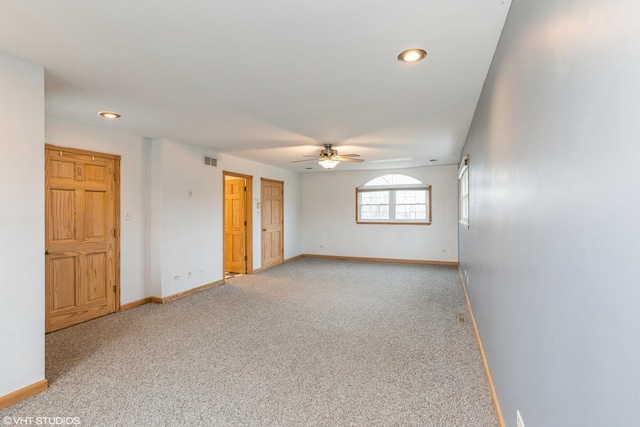 unfurnished room featuring light carpet, baseboards, visible vents, ceiling fan, and recessed lighting