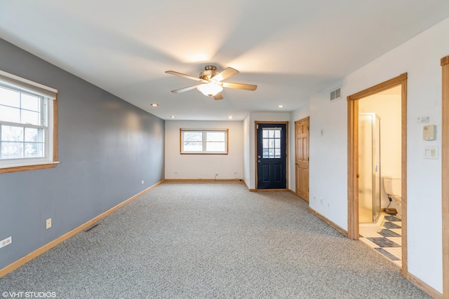 unfurnished room featuring light carpet, baseboards, visible vents, a ceiling fan, and recessed lighting