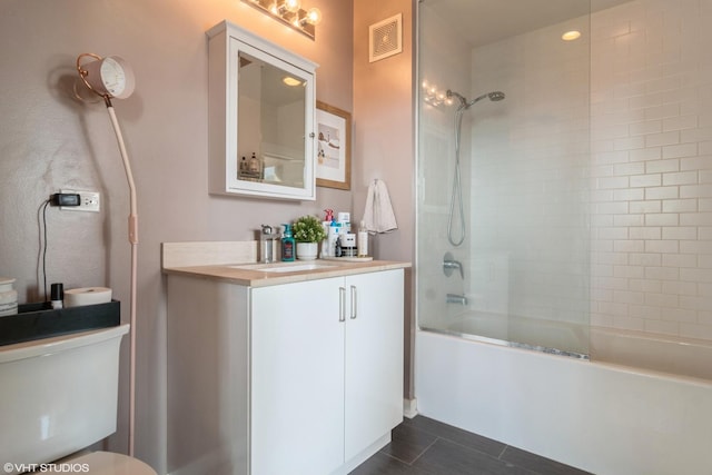 full bathroom featuring shower / bathtub combination, tile patterned flooring, toilet, vanity, and visible vents