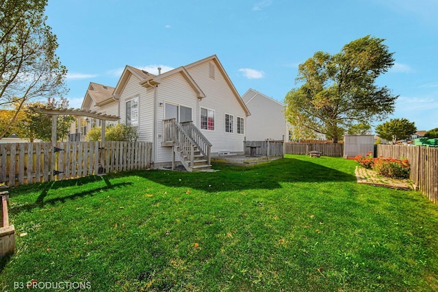 back of property featuring a fenced backyard, a yard, and a pergola