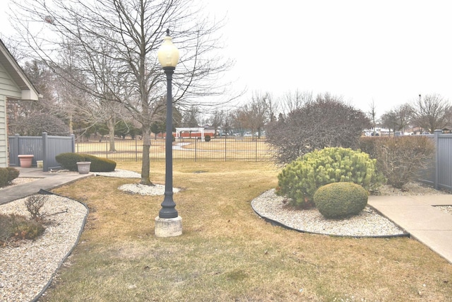 view of yard featuring fence