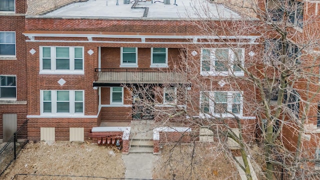 multi unit property featuring brick siding