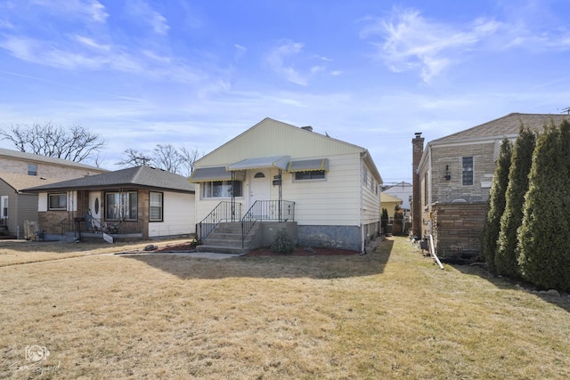 bungalow with a front lawn