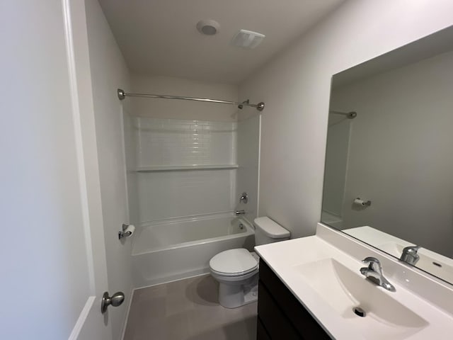 bathroom featuring vanity, toilet, and shower / washtub combination