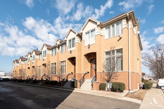 view of building exterior with a residential view