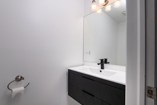 bathroom with visible vents and vanity