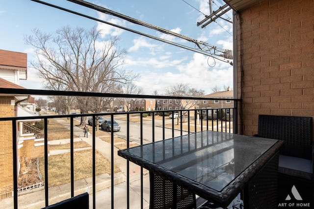 balcony featuring a residential view