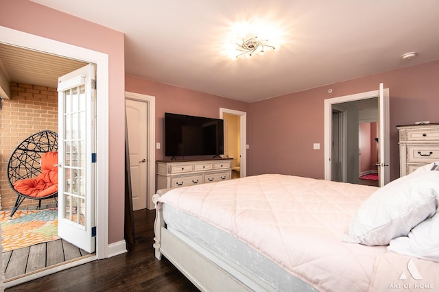 bedroom with dark wood finished floors