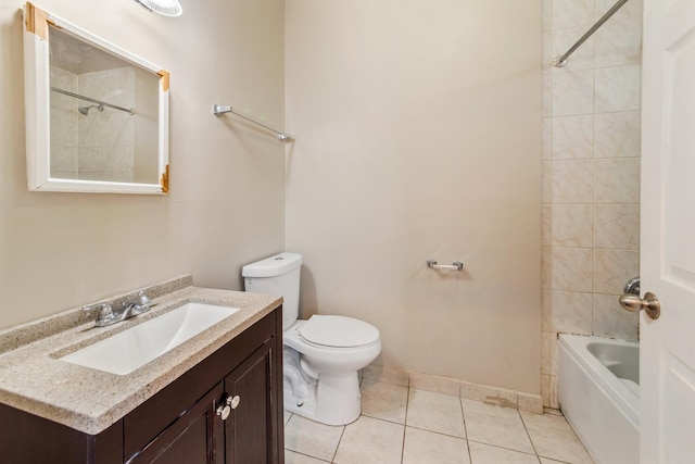 full bath with shower / washtub combination, vanity, toilet, and tile patterned floors