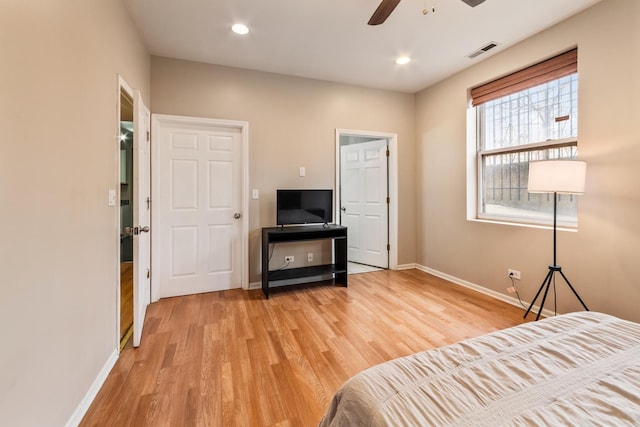 bedroom featuring light wood-style flooring, recessed lighting, visible vents, and baseboards