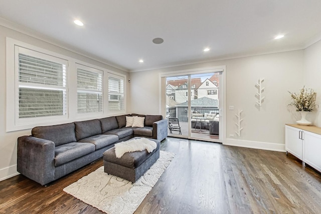 living area with recessed lighting, baseboards, crown molding, and wood finished floors