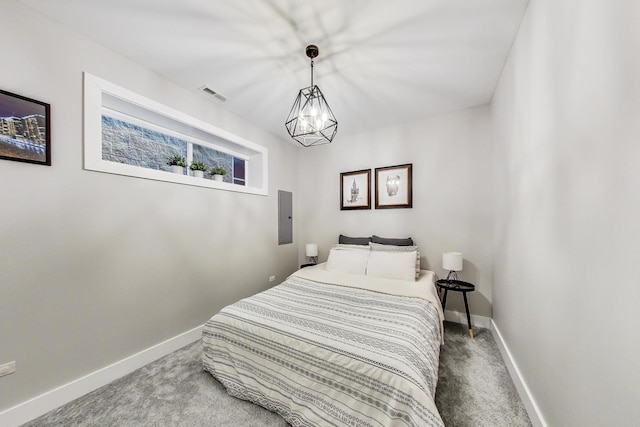 bedroom with carpet floors, visible vents, and baseboards