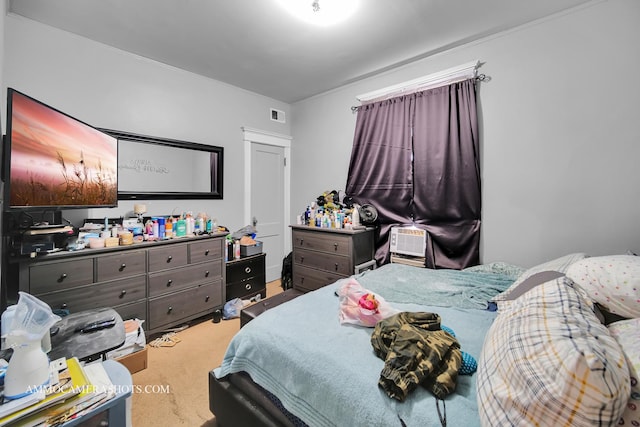 bedroom featuring visible vents and carpet flooring