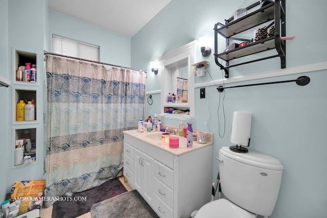 full bathroom with vanity, toilet, and a shower with curtain