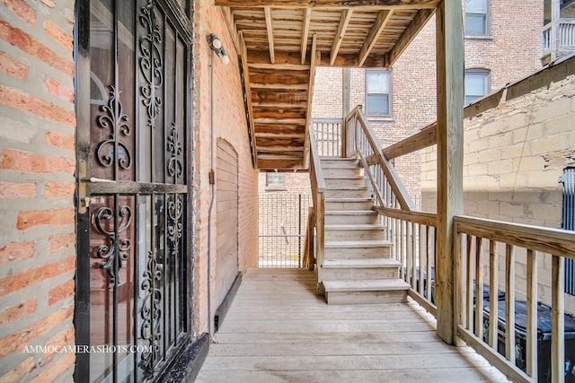 entrance to property with brick siding