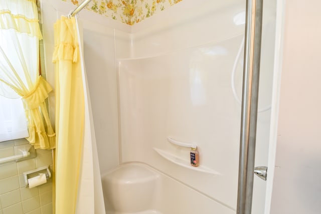 bathroom with a stall shower