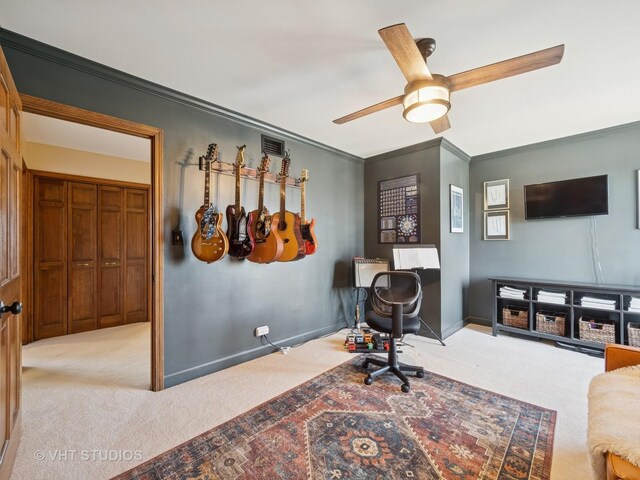 home office featuring visible vents, carpet, and crown molding