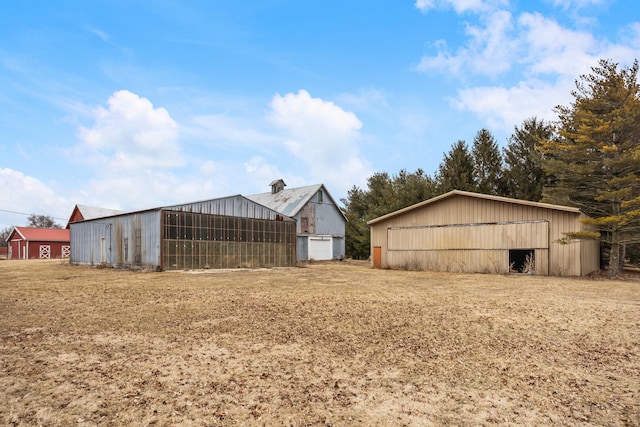 exterior space with an outbuilding and an outdoor structure