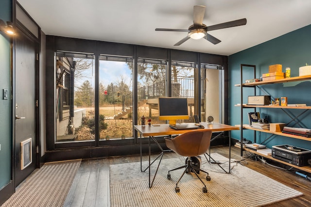 office area featuring wood-type flooring and ceiling fan