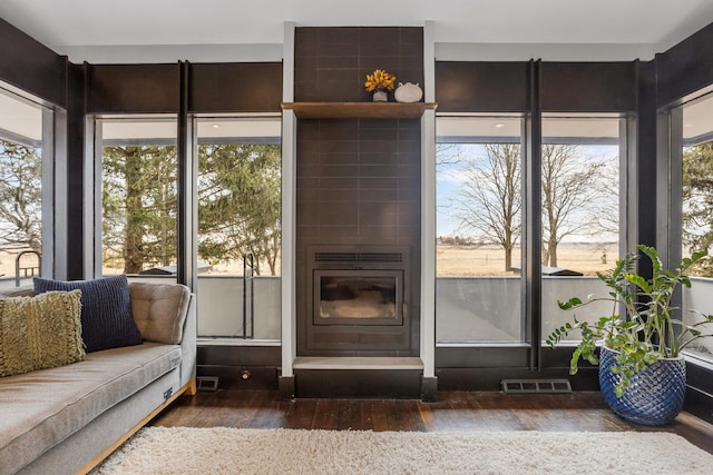 interior space featuring visible vents and wood finished floors