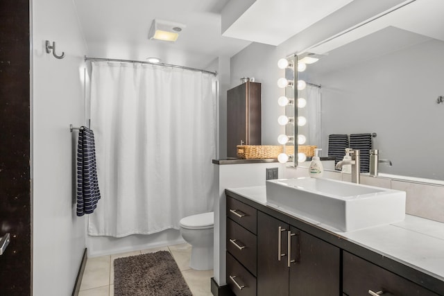 full bathroom featuring shower / bathtub combination with curtain, toilet, vanity, and tile patterned flooring