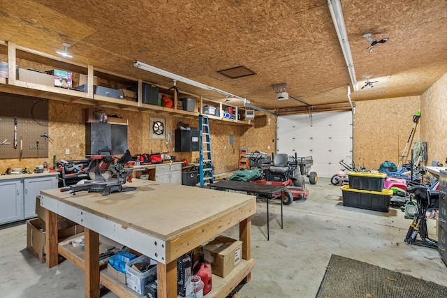 garage featuring a workshop area