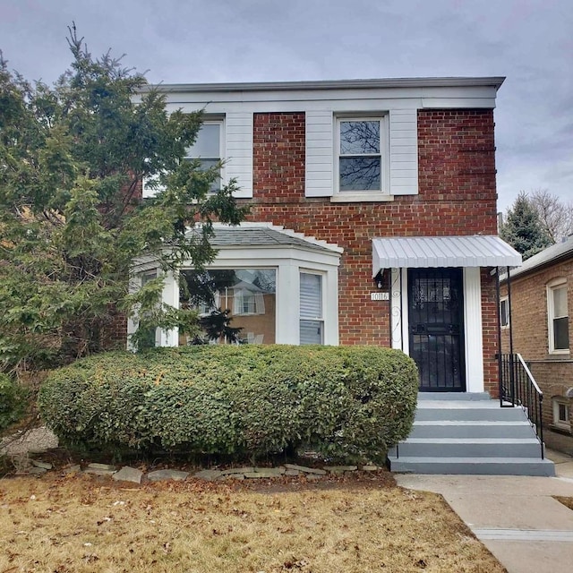 view of front of property with brick siding