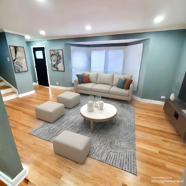 living area with stairs, recessed lighting, and wood finished floors