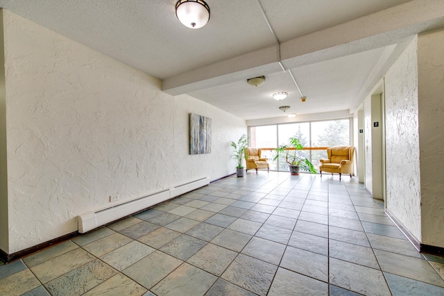 unfurnished sunroom featuring a baseboard heating unit