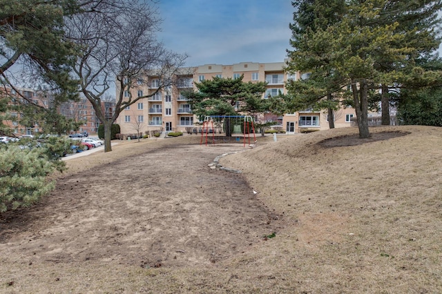 view of community featuring a residential view and playground community