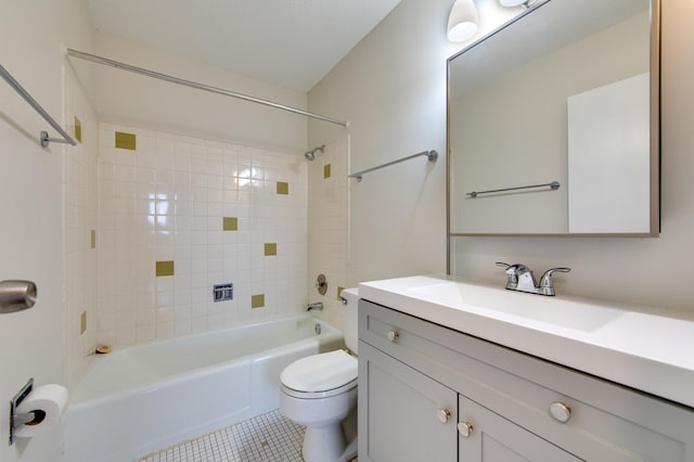 bathroom with vanity, tile patterned flooring, bathtub / shower combination, and toilet