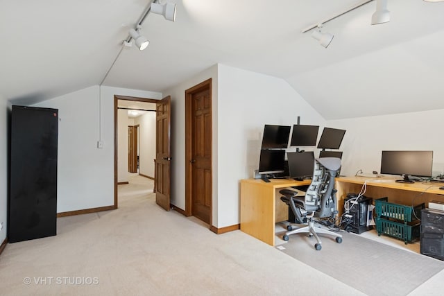 1109 E Gartner Rd, Naperville, IL 60540 - home office featuring track lighting, vaulted ceiling, and light colored carpet