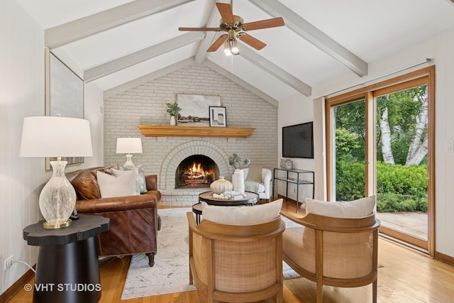 1109 E Gartner Rd, Naperville, IL 60540 - living area featuring brick wall, light wood finished floors, ceiling fan, and a brick fireplace